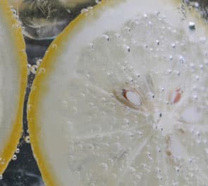 Closeup of lemon slices in water
