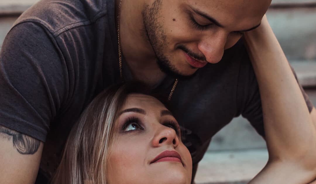 Man and woman intimately look at each other, One Simple Way to Reconnect in Your Marriage