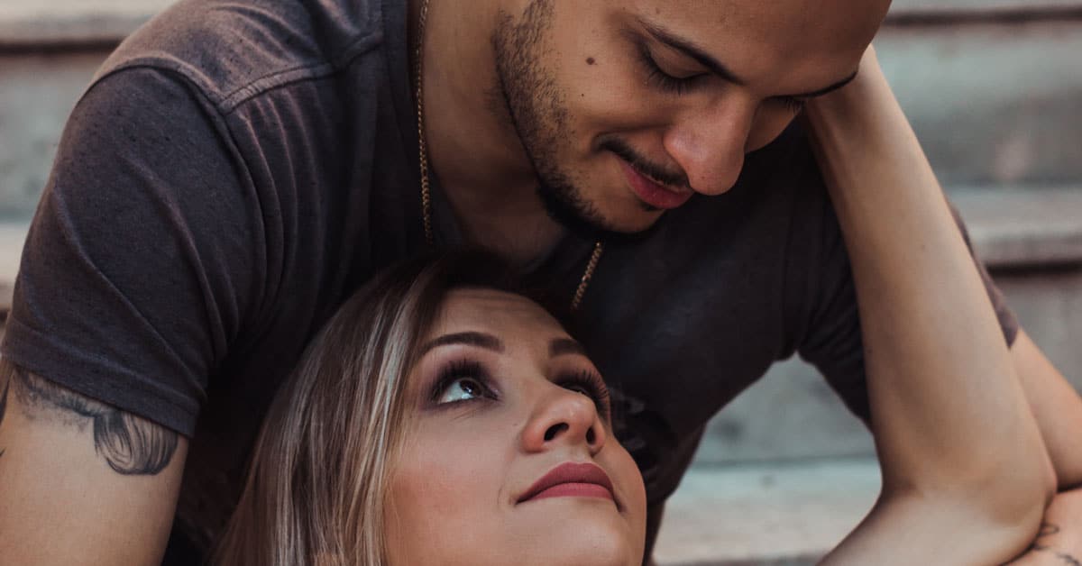 Man and woman intimately look at each other, One Simple Way to Reconnect in Your Marriage