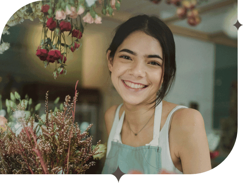 Portrait of a teen girl at a flower shop