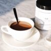 cup of coffee with aspoon