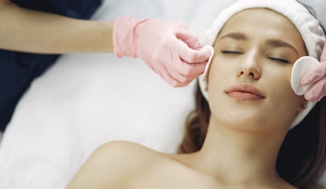 A woman receives a chemical peel at a med spa
