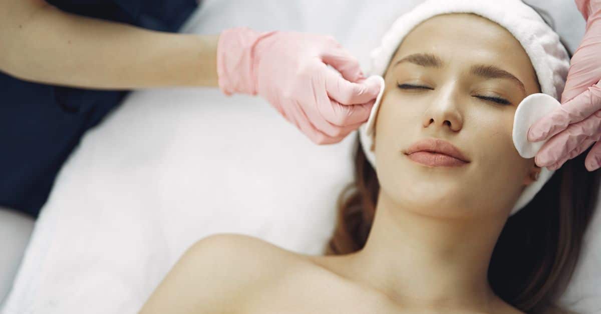 A woman receives a chemical peel at a med spa