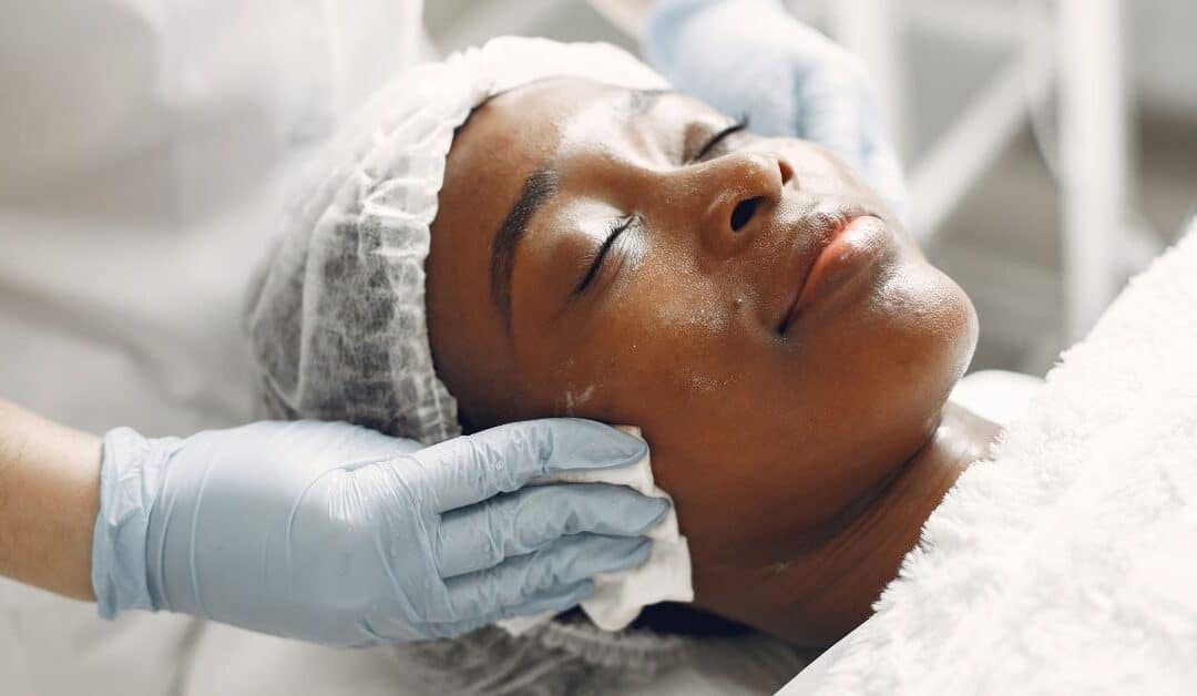 A woman receives a skin treatment at a medical spa