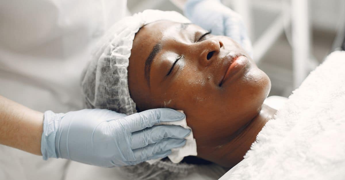 A woman receives a skin treatment at a medical spa