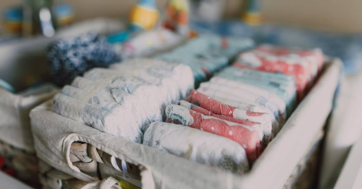 diapers stacked in rows in a basket